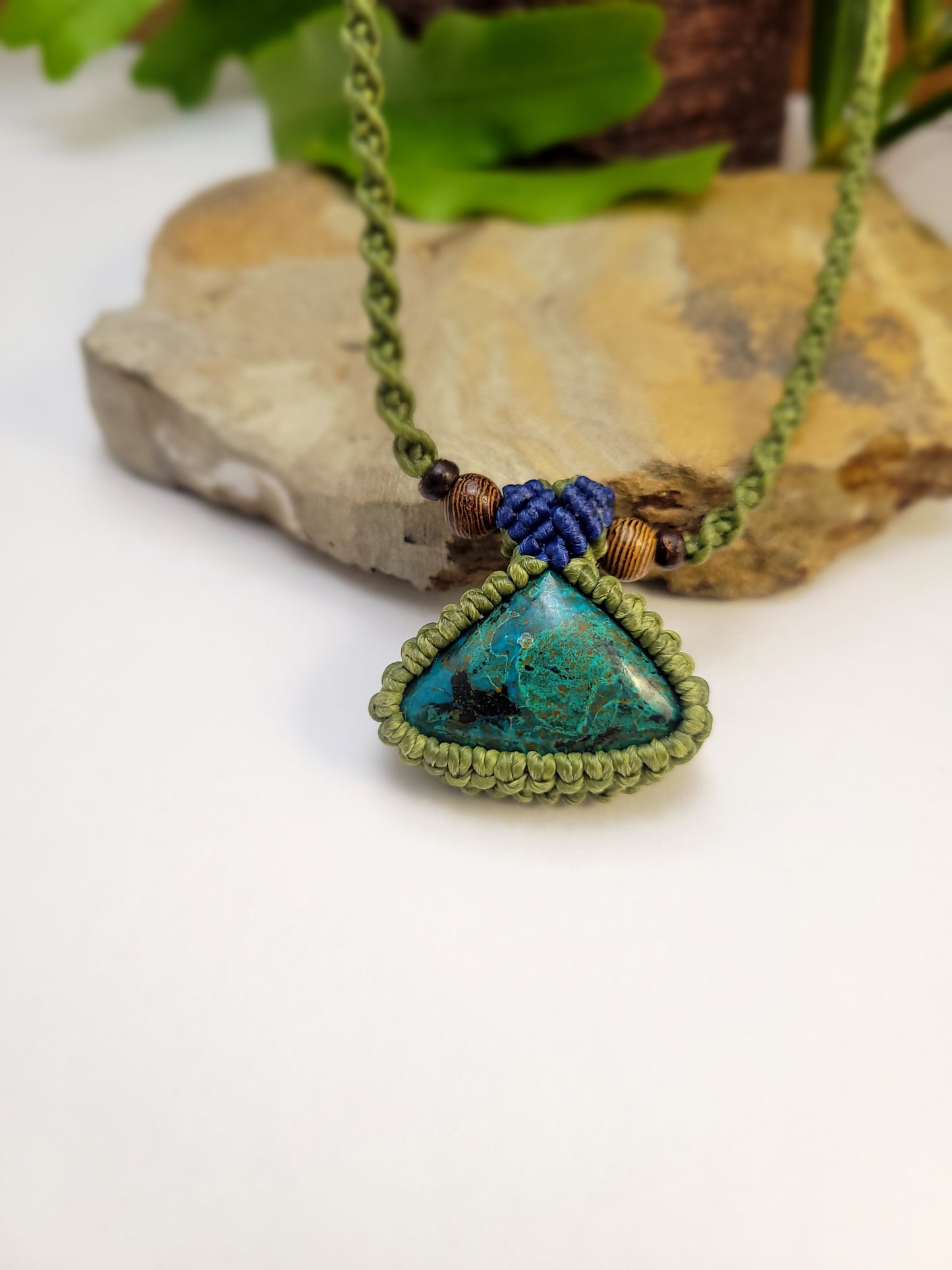 Handcrafted Triangular Cabochon Stone Pendant Necklace – 12-Inch Olive Green Macrame with Blue Accents and Wood Beads